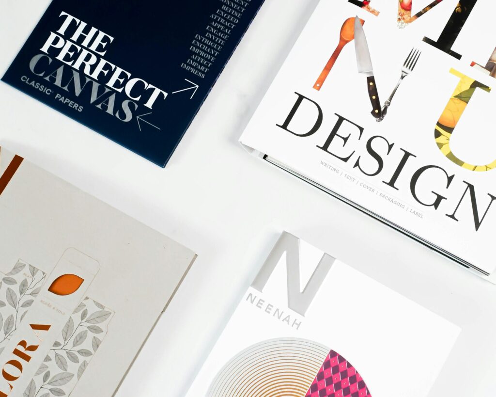 Graphic design books and templates representing Envato Market digital asset marketplace